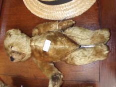 Early 20th century straw filled teddy bear
