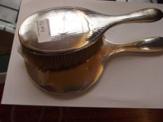 Silver bedroom brush and mirror