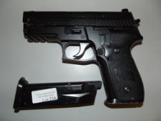 Sig Sauer style gas pistol with two magazines