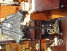 Metal table lamp on paw feet