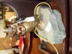 Copper owl lamp on a rock base