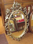 Gilt framed Rococo style mirror