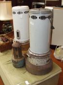 Two paraffin heaters together with a smaller heate