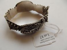 Ornate silver bangle, 62 grams