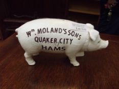Cast iron money box in the form of a pig
