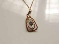 9 ct gold chain and pendant with blue stone, 4 gra