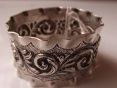 Silver napkin ring dated 1897.