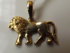 14 carat gold lion pendant, 5.4 grams