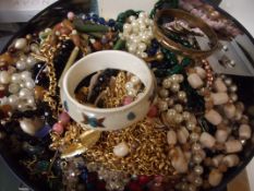 Large tin of costume jewellery