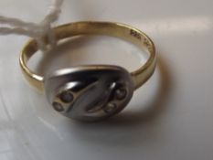 14 carat gold set with four diamonds