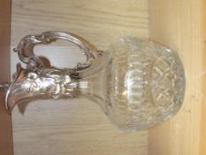 Silver plated and glass claret jug