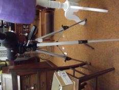 Spotting scope on adjustable tripod