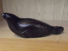 Inuit hardstone carving in the form of a seal