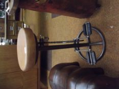 Industrial style bar stool with pedals and chain