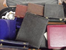 Large suitcase of flatware and others