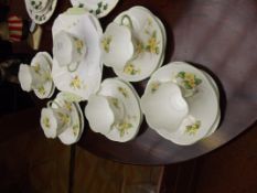 Shelley Primrose part tea set, five trios and one