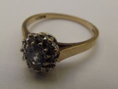 9 carat gold dress ring set with large blue centra