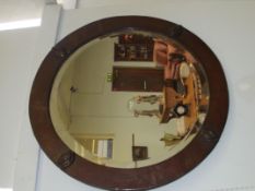 Arts and crafts circular wall mirror with hammered