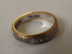 18 carat gold eternity ring set with 9 diamonds, s
