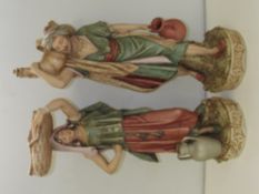 Pair of large Royal Dux figures, modelled as water