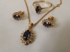 14 carat gold pendant, earring and ring set, with