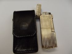 Dunhill 14ct gold cigarette lighter with case