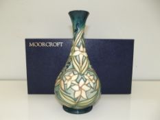 Moorcroft footed bottle vase, Jasmine Carousel pat
