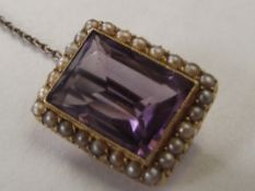 15 carat yellow gold brooch set with large amethys