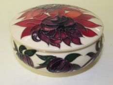 Moorcroft lidded bowl in the Red Ruby pattern, dia