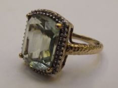 9 carat gold dress ring with large green emerald s