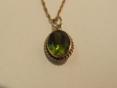 9 carat gold peridot chain and pendant with safety