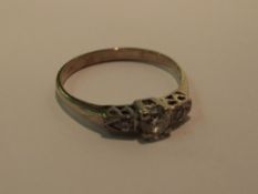 Yellow metal (tested for high carat) three stone d