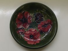 Moorcroft dish in the Anemone pattern, painted and