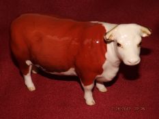 A Beswick Hereford cow, Ch. of Champions 12cm high
