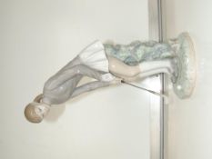 Lladro figure of a lady golfer 28cm high