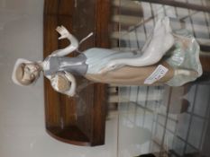 Lladro figure of a girl with goose
