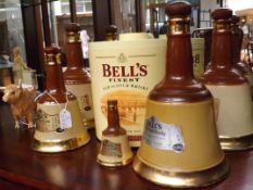 5 Wade decanters together with an ice bucket