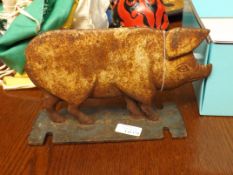 Iron pig boot scraper