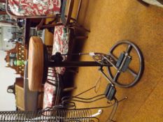 Bar stool with pedal foot rests and a leather seat