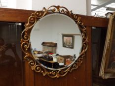 Ornate bevelled mirror