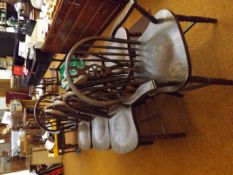 Set of 8 wheel back dining chairs
