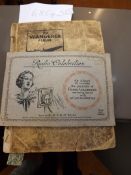 Stamp album and a cigarette card album