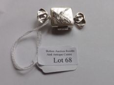 Solid silver pill box in the form of a sweet.