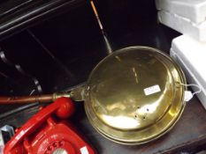 Early brass bed warmer