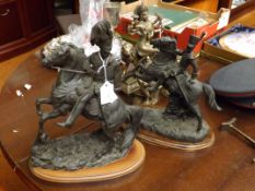 Two military figures on horse back