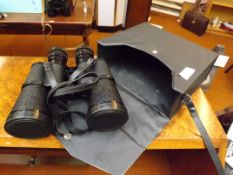 A pair of cased field glasses