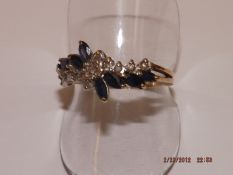 9 ct gold dress ring with sapphires and diamonds
