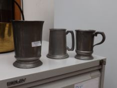 3 pewter tankards.