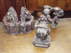 Pair of cherubs candle holders with wooden figure