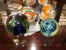 4 Paperweights to include 1 signed mdina